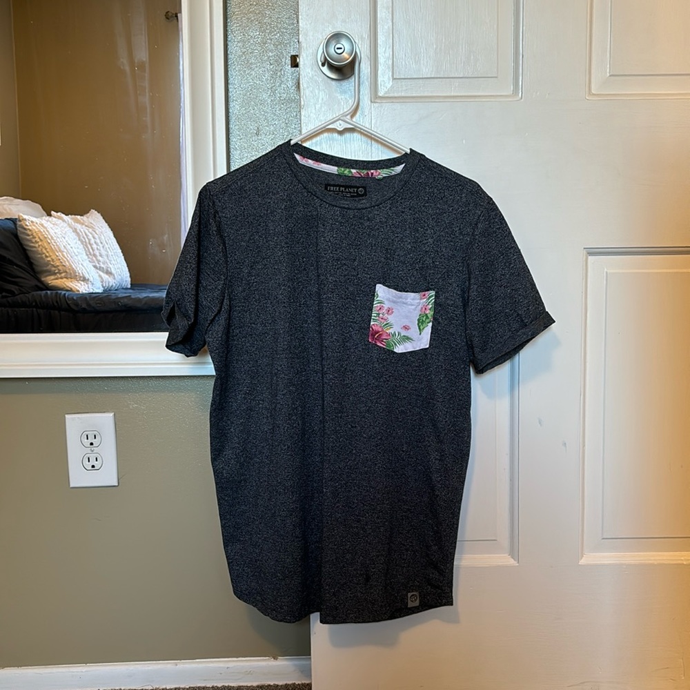 Free Planet Heather Blue Top with a Fun Pocket Design